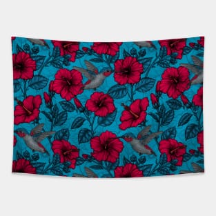 Red hibiscus and hummingbirds, tropical garden on light blue Tapestry