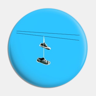 Shoes on a Wire Pin