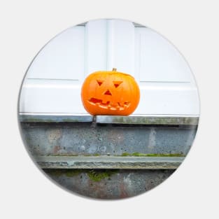 front door of house with Halloween decorations Pin