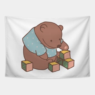 Little teddy bear plays with toys on a baby onzie or sweatshirt Tapestry