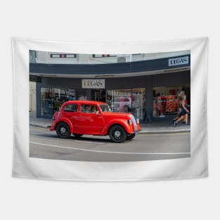 Red Morris 8 car in deco city of Napier New Zealand. Tapestry