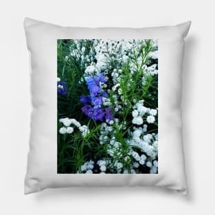 Delphinium surrounded by tiny white flowers Pillow