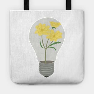 Light blub with yellow flowers growing inside Tote