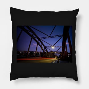 Perspective of an iron bridge with car light trails at twilight in Berlin, Germany Pillow