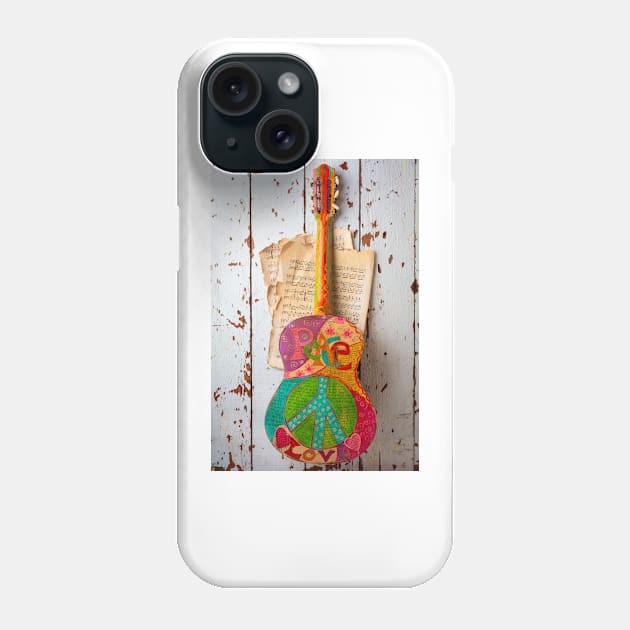 Love Peace Guitar Hanging On Wall Phone Case by photogarry