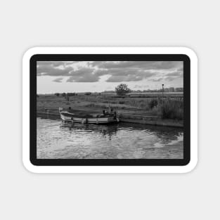 Wooden boat moored in Thurne Dyke in the Norfolk Broads National Park Magnet