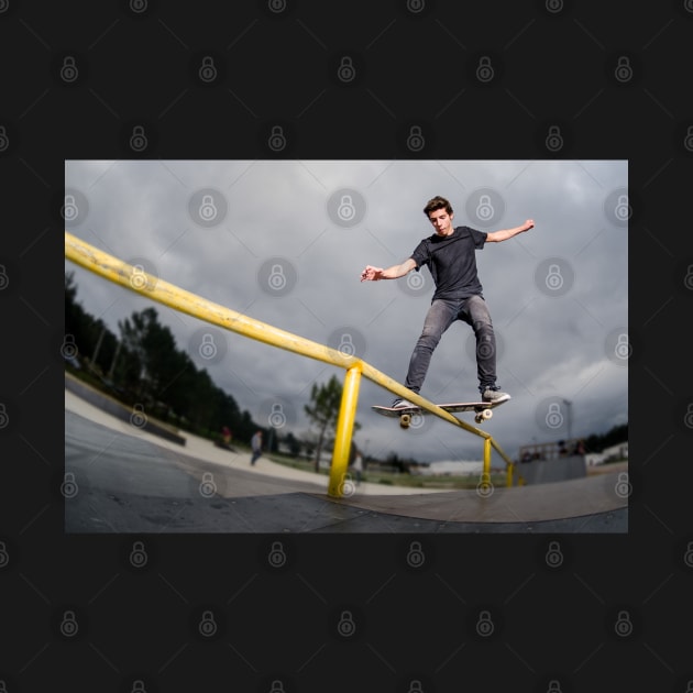 Skateboarder doing a board slide by homydesign