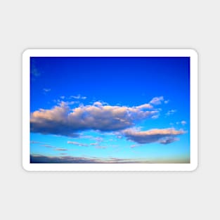 Serene blue sky with pink clouds Magnet