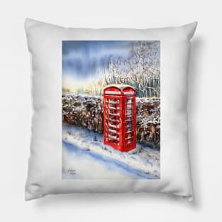 Red telephone box in the snow Pillow