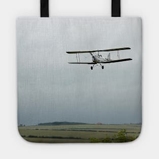 Vintage Tiger Moth aircraft on approach to land to a Norfolk airfield, UK Tote