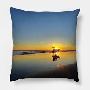 A silhouetted horse-drawn carriage on Parangtritis beach at sunset 4 Pillow