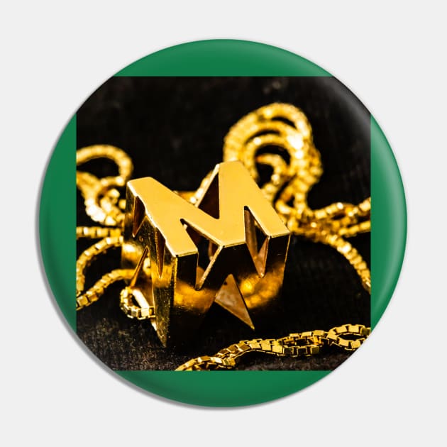 Golden M Pin by thadz