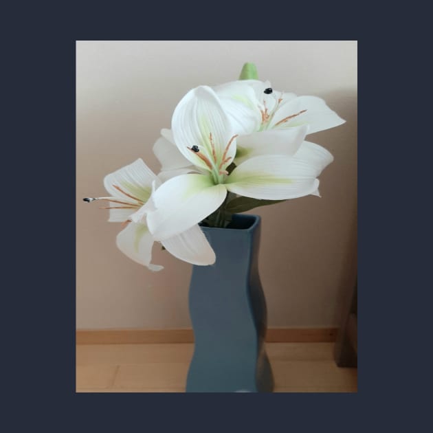 A white lily by Designs and Dreams