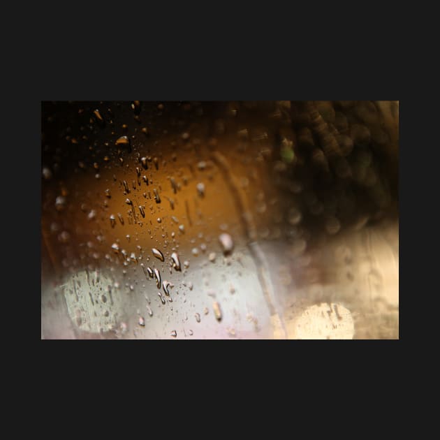 Deatil of raindrops on a car windshield at night by Reinvention