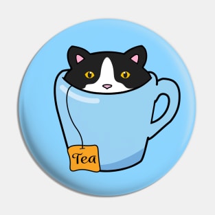 Cute tuxedo cat sitting in a cup of tea Pin