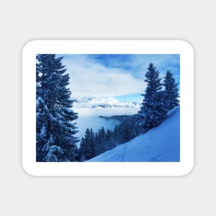 Snowy mountain top in Switzerland Magnet