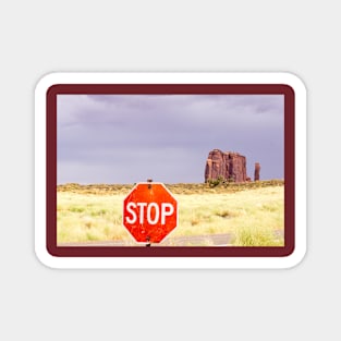 Stop sign in approach road to Monument Valley Magnet