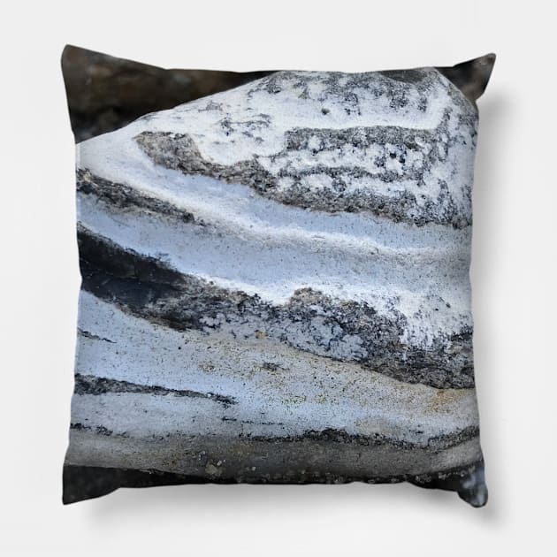 Close-up of beautiful layered triangular stone rock in white and grey stripes Pillow by Khala