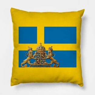 Swedish flag with Swedish coat of arms in foreground. Pillow