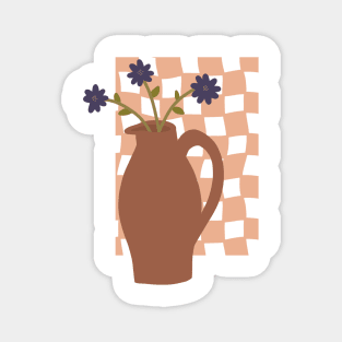 large terracotta vase with a trio of blue flowers on checkerboard background Magnet