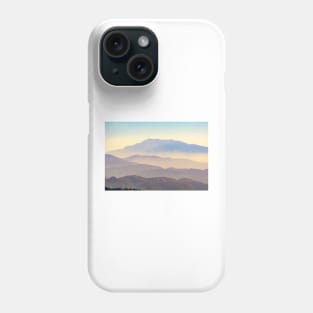 Mountain layers rising to distant peak through hazy light and different color bands. Phone Case