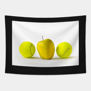 Yellow apple between tennis balls Tapestry