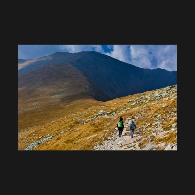 Mother and son hiking into the mountains by naturalis