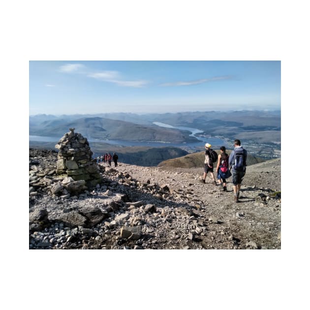 Hikers pass a navigation cairn as they descend back down Ben Nevis by richflintphoto