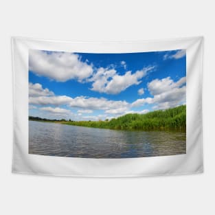 Blue cloudy summer sky over Bug river, Poland, Europe Tapestry