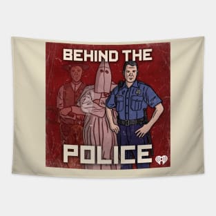Behind the Police Tapestry