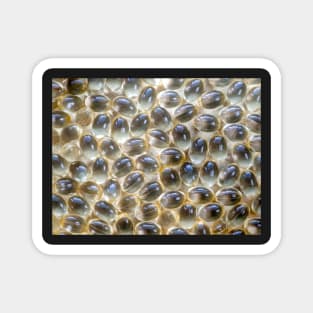 Golden capsules Magnet