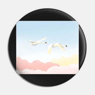 Graceful white swans flying in the blue sky Pin