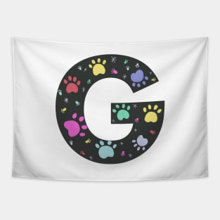 G letter  with colorful paw print Tapestry