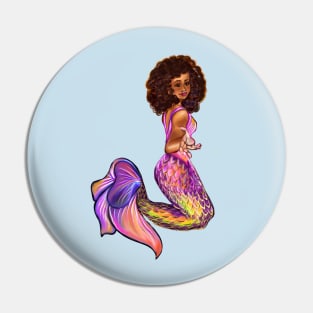 Mermaid  with rainbow coloured colored fins, outstretched  arm, brown eyes, Curly hair  and caramel brown skin - light background Pin