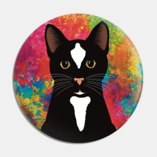 The cute and alert black and white tuxedo cat is waiting and watching you , colorful  background Pin