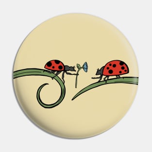 Ladybug Lovers Share a Flower Pin