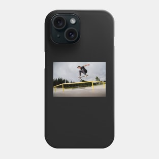 Skateboarder doing a ollie Phone Case