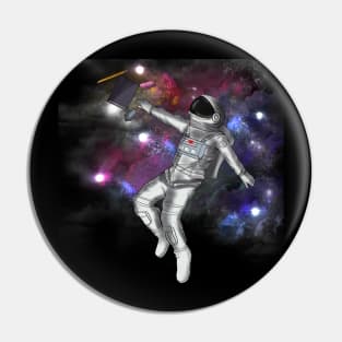 Astronaut Grabbing Art Supplies Pin