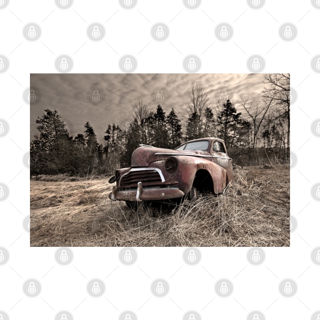 Abandoned rusted old truck in field by Jim Cumming