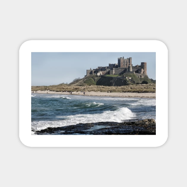 Waves coming ashore near Bamburgh Castle, Northumberland, UK Magnet by richflintphoto