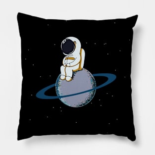 Astronaut Sitting On A Planet Pillow