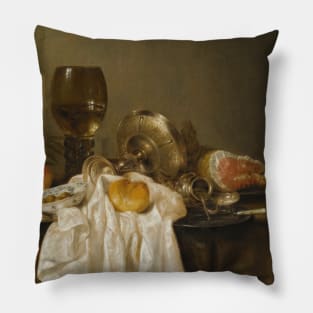 A Banketje Still Life With A Roemer, A Silver Tazza On Its Side, A Ham, Peaches, A Salt Cellar, A Bread Roll And A White Cloth On A Partly Draped Table by Willem Claeszoon Heda Pillow