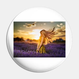 Young woman in blooming lavender field Pin