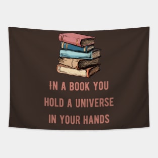 In a book you hold a universe in your hands pink text Tapestry