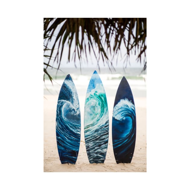 Surf boards with painted ocean waves on the beach with trees by DamiansART