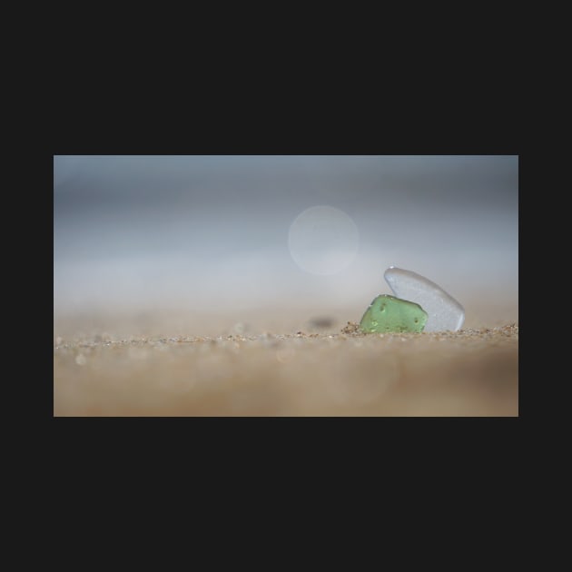 Two Shards of Sea Glass Together in the Sand by 1Redbublppasswo