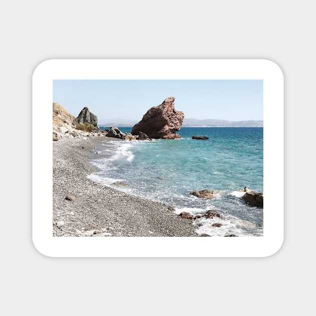 Shoreline with pebbles and blue water Magnet by Melissa Peltenburg Travel Photography