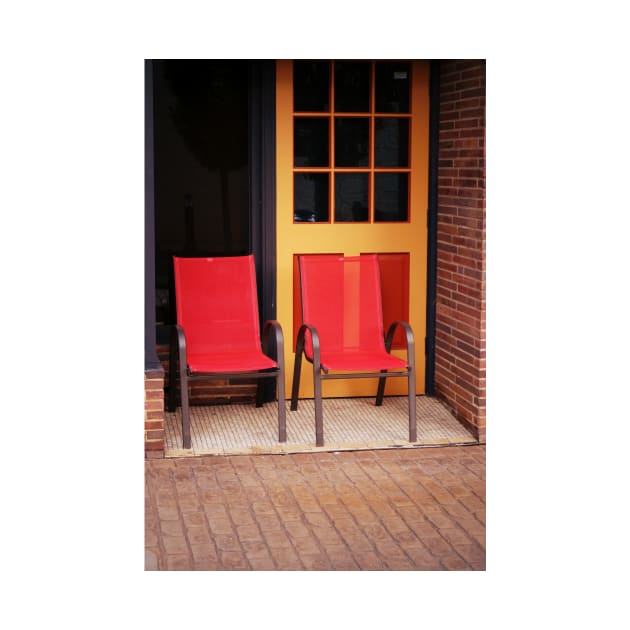 Two Red Chairs In Doorway by Rodwilliams