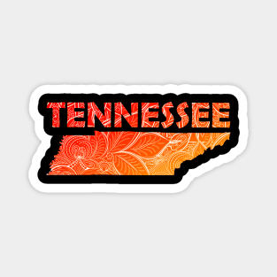 Colorful mandala art map of Tennessee with text in red and orange Magnet