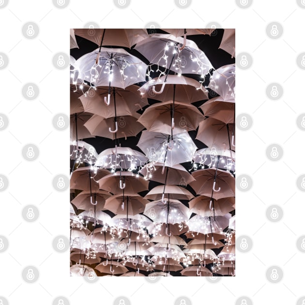 The beauty of white umbrellas illuminated by Christmas lights decorating the streets of Agueda Portugal by AnaMOMarques